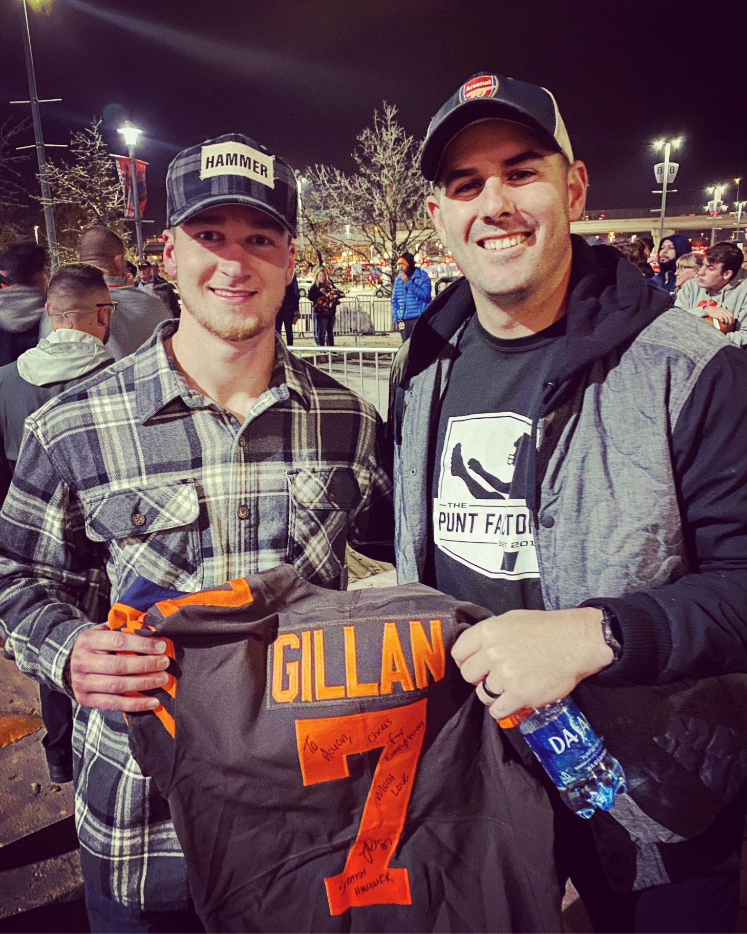 Aaron Perez with NFL punter Jamie Gillan — Cleveland Browns jersey