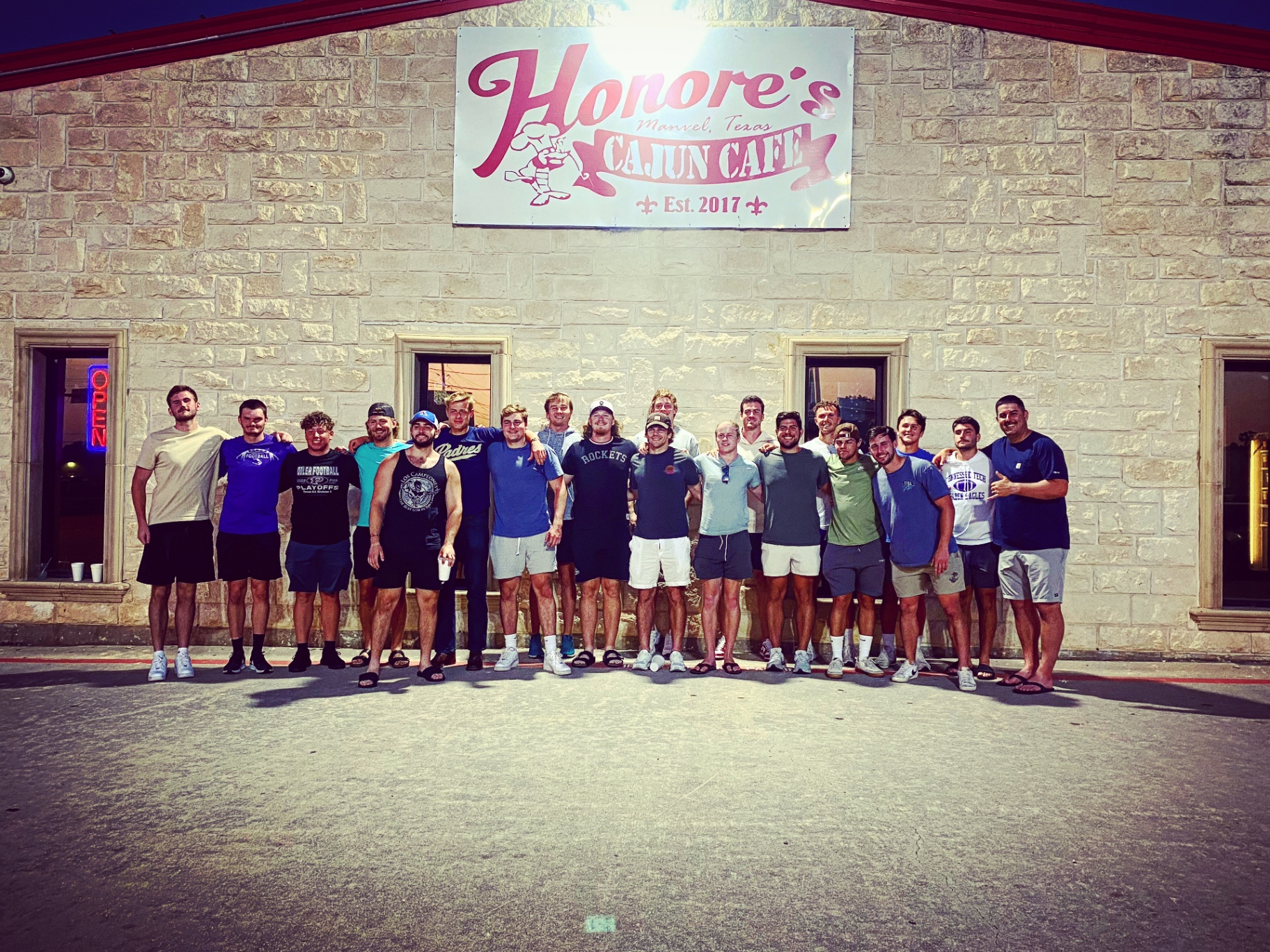Camp athletes group dinner in Texas